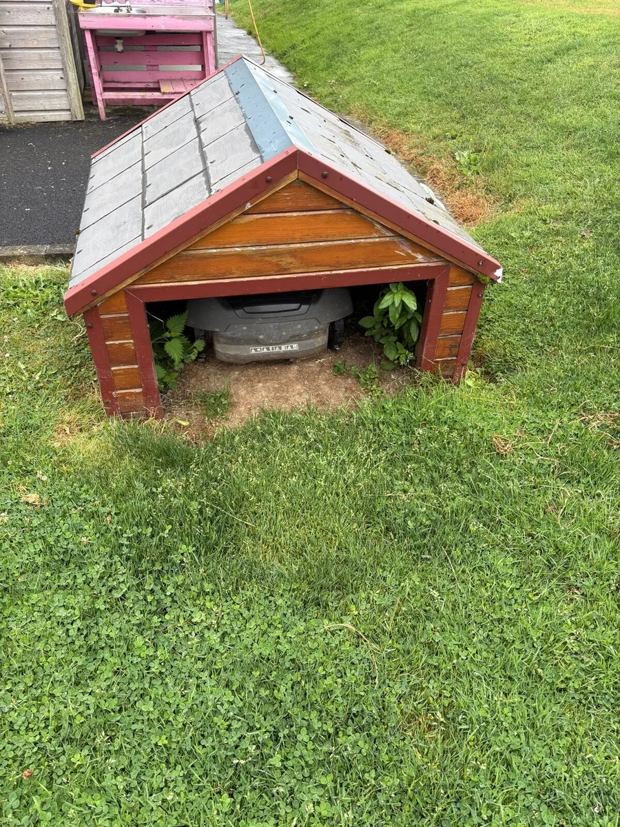 Husqvarna 450x robot mower and house - Image 1