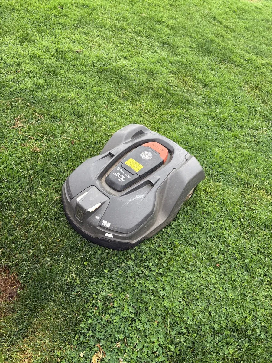 Husqvarna 450x robot mower and house - Image 2