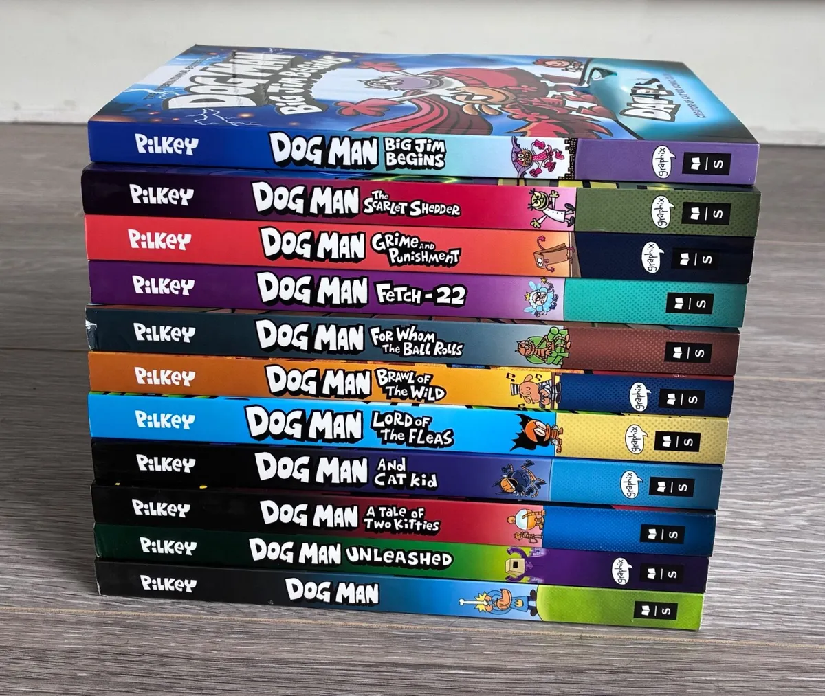 BRAND NEW Dog Man - €10 each or all 11 for €90