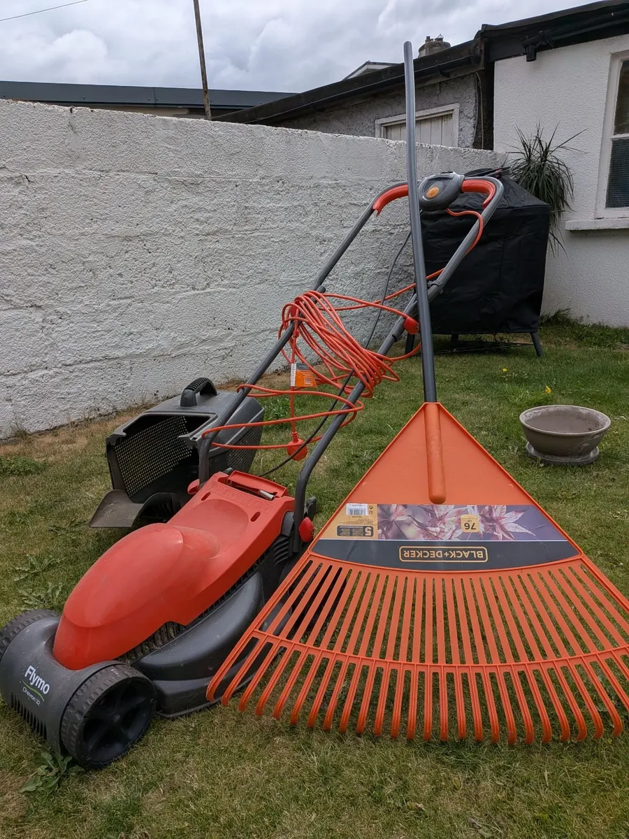 Lawnmower and Rake - Image 1