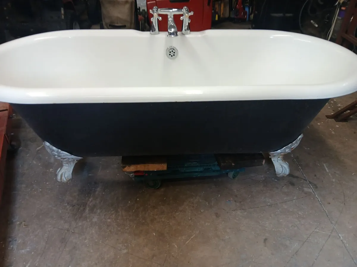 Cast iron bath & taps - Image 1