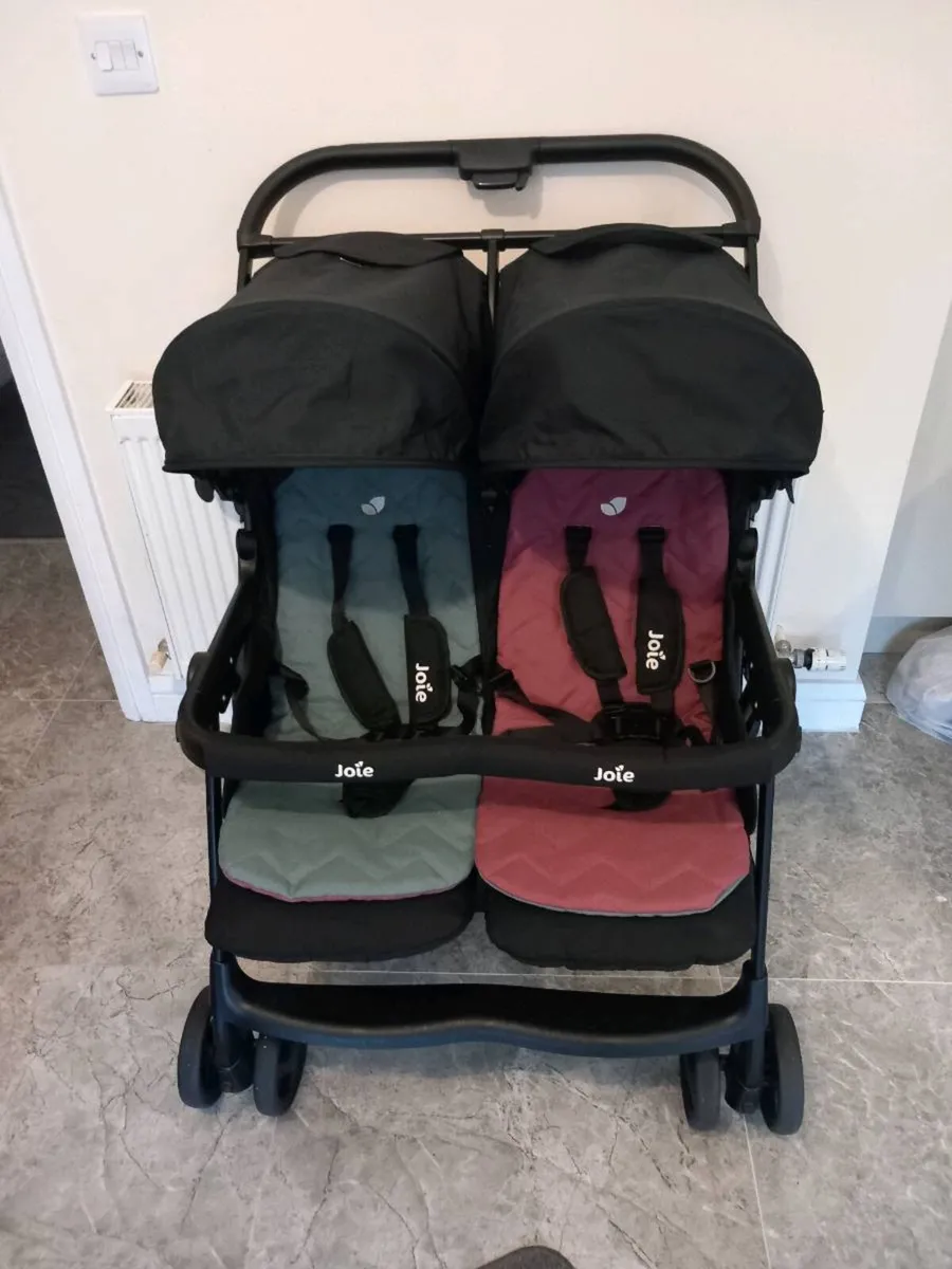 Joie baby's double buggy.  With rain cover - Image 1