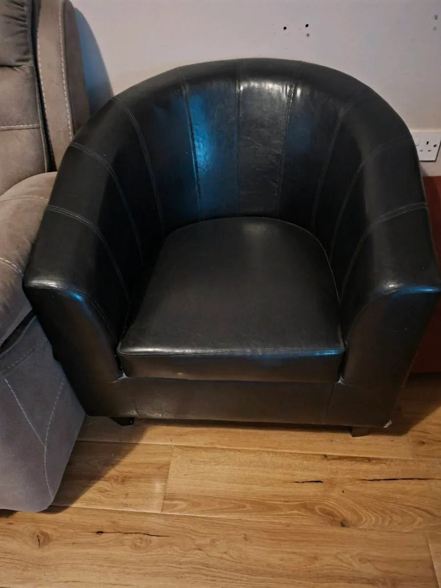 Large black tub chair
