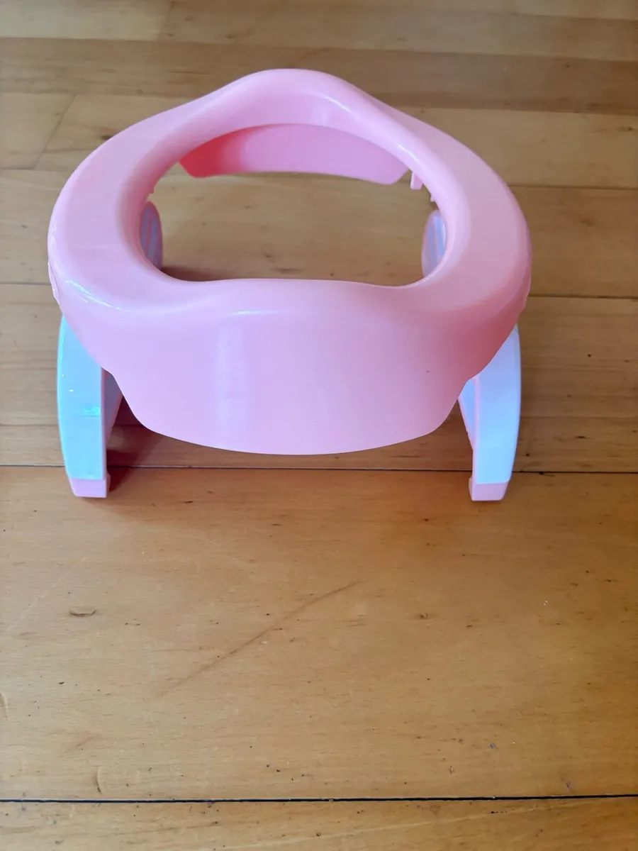 2 in one travel potty and training toilet seat - Image 1
