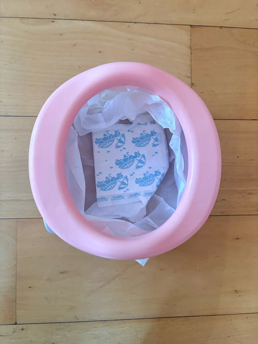 2 in one travel potty and training toilet seat - Image 2