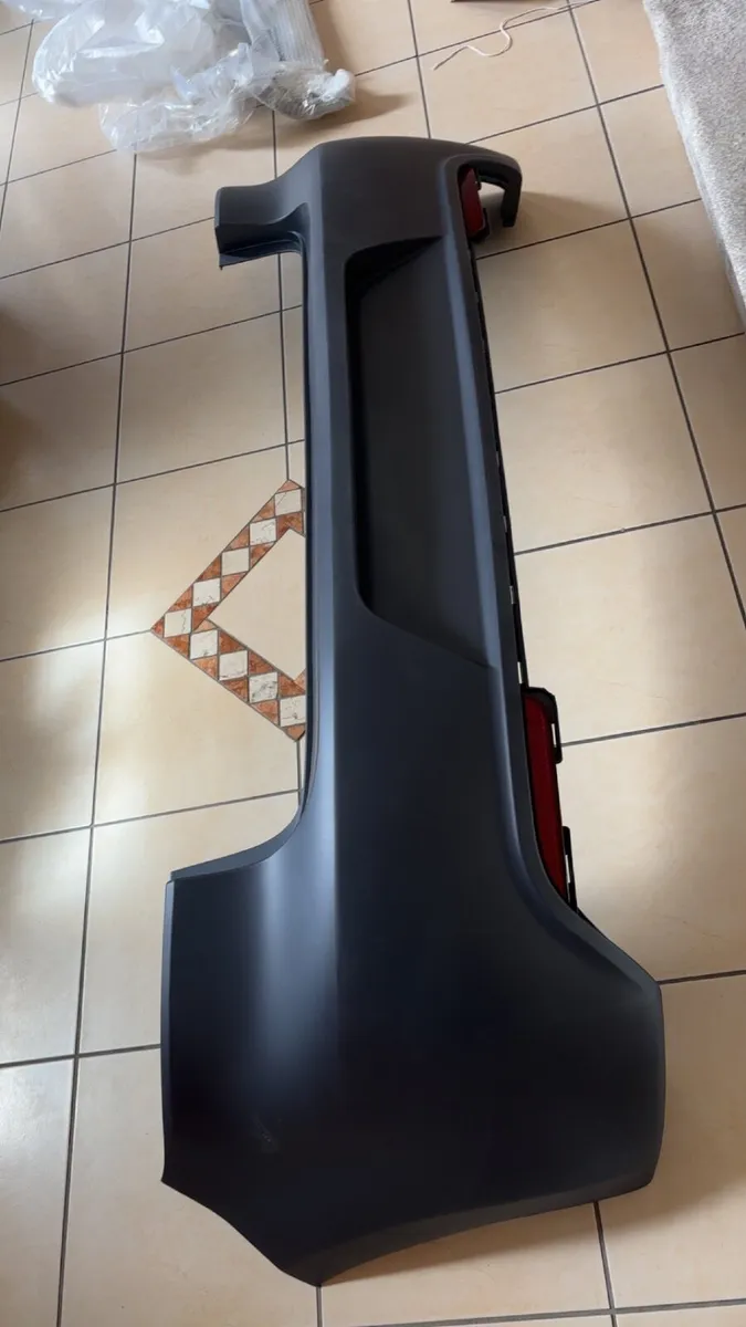 Rear bumper for Volkswagen and lower spoiler - Image 1