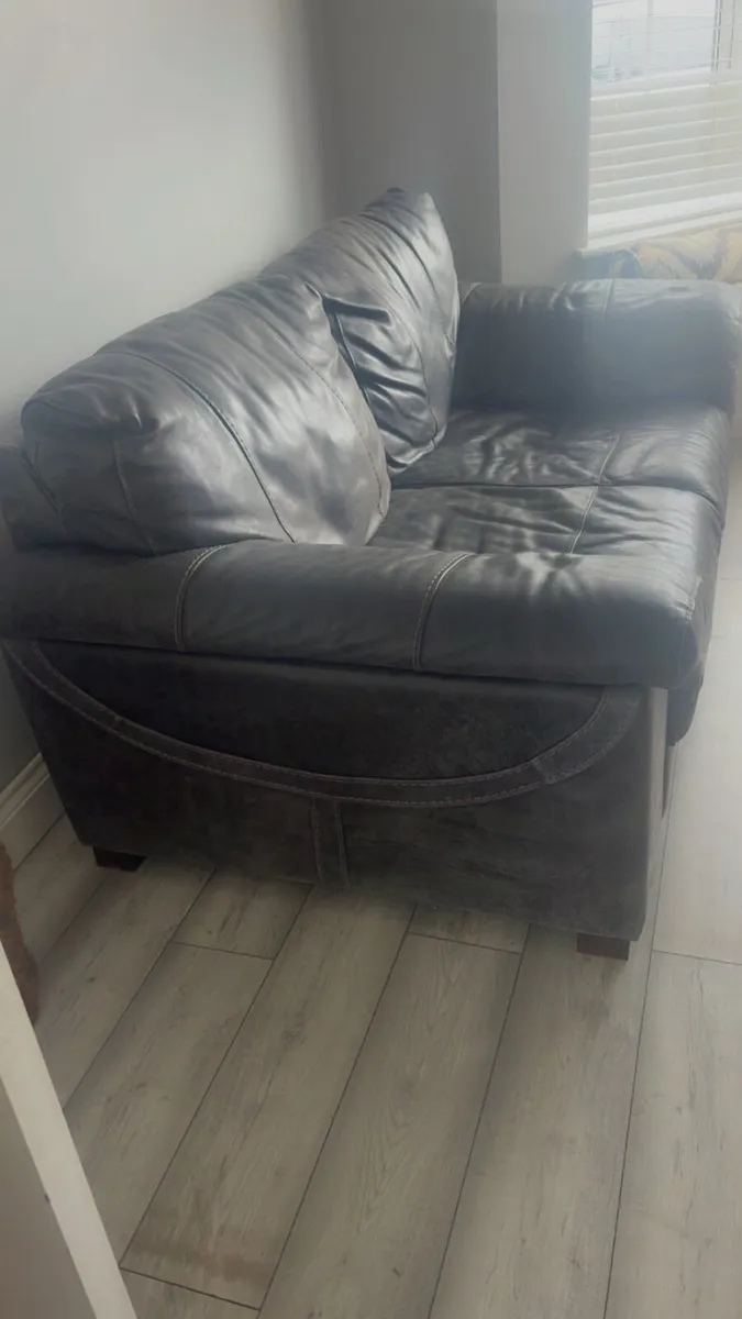 2 1/2 seater leather charcoal grey sofa - Image 1