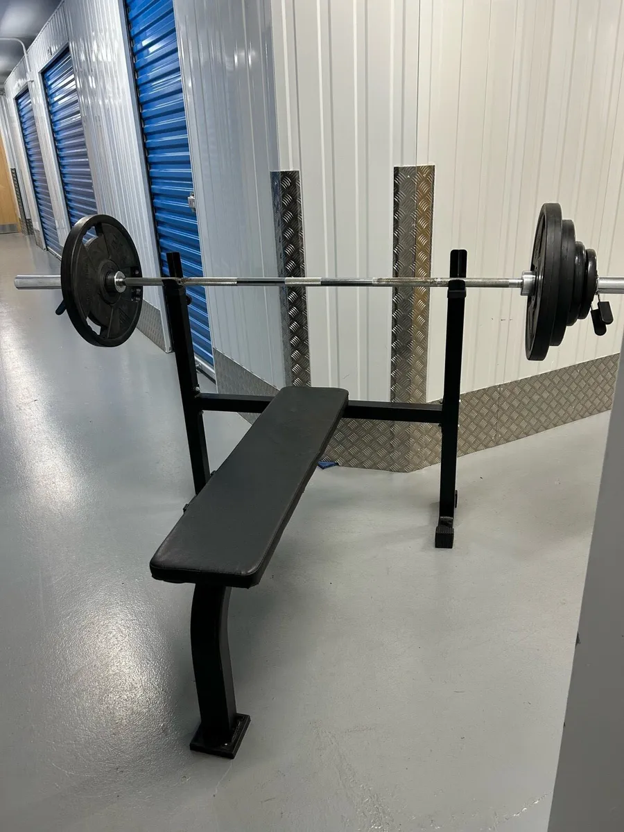 Adjustable Bench Press with Olympic weight set - Image 1