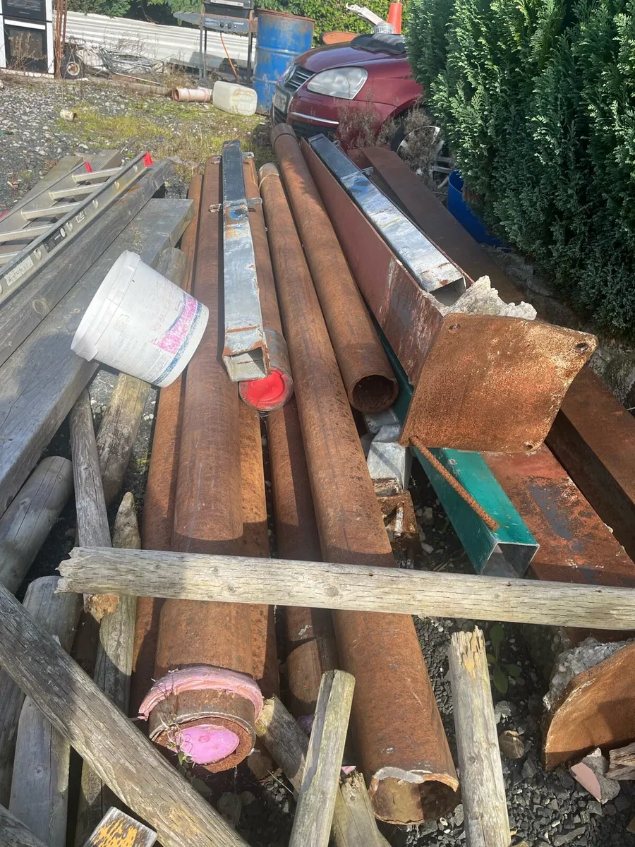 Selection of drill pipe and girders and posts - Image 1