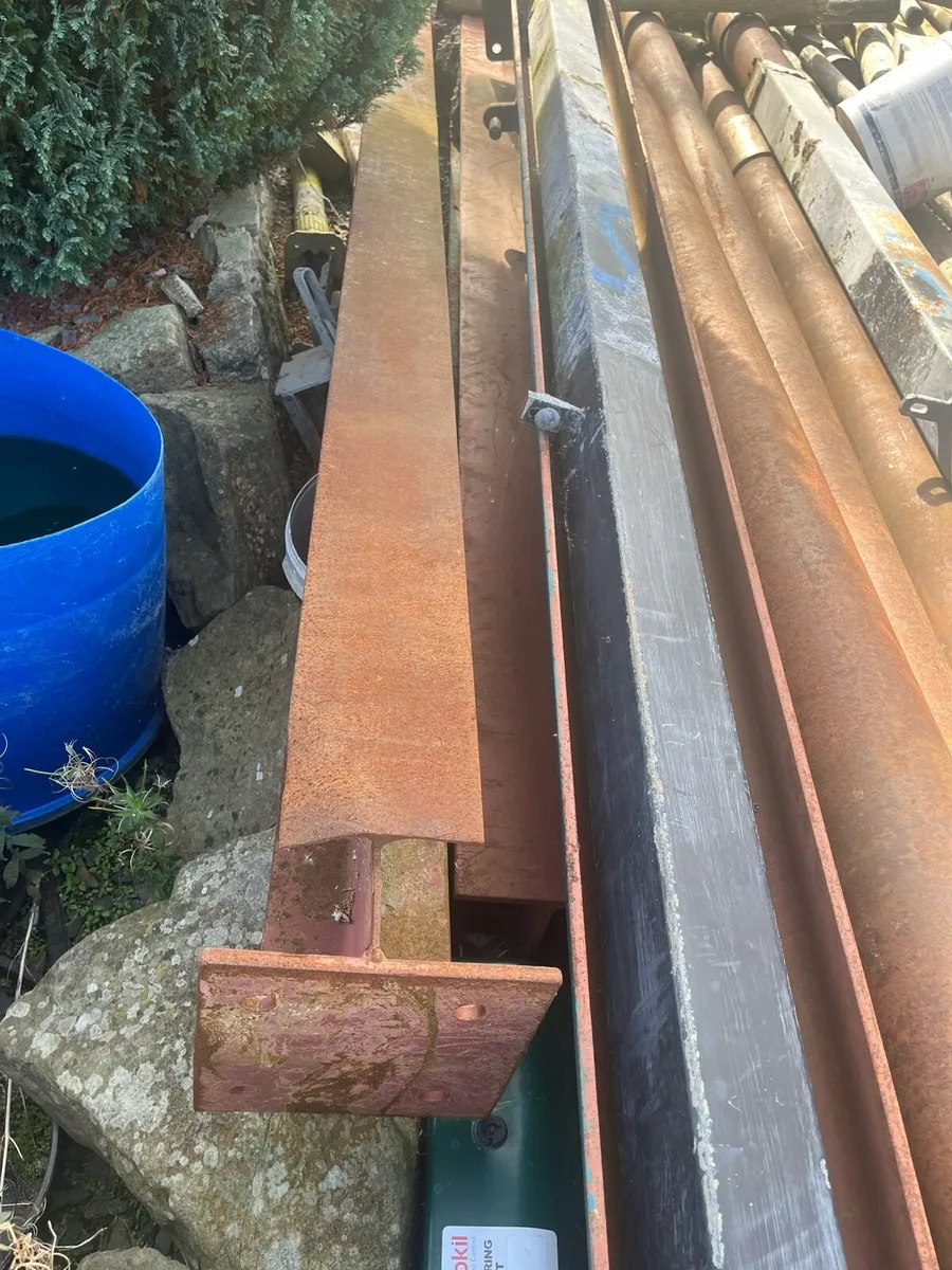 Selection of drill pipe and girders and posts - Image 3