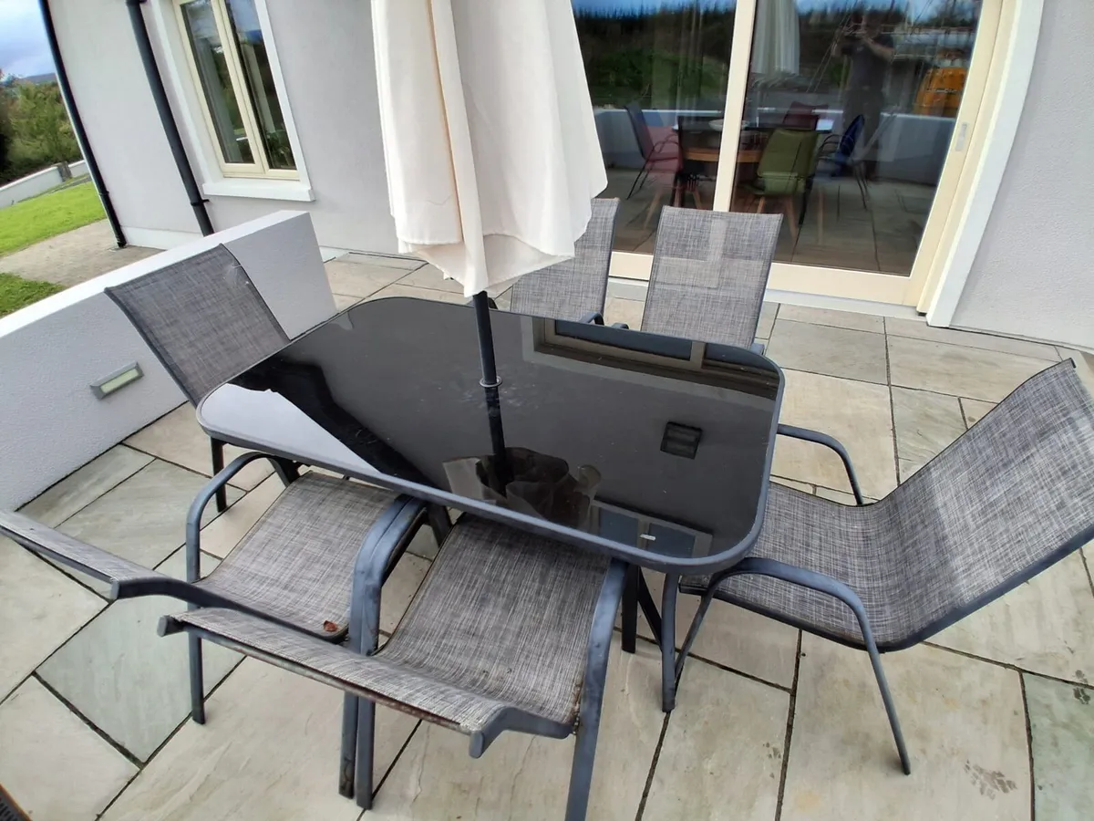 Patio table and 6 chairs