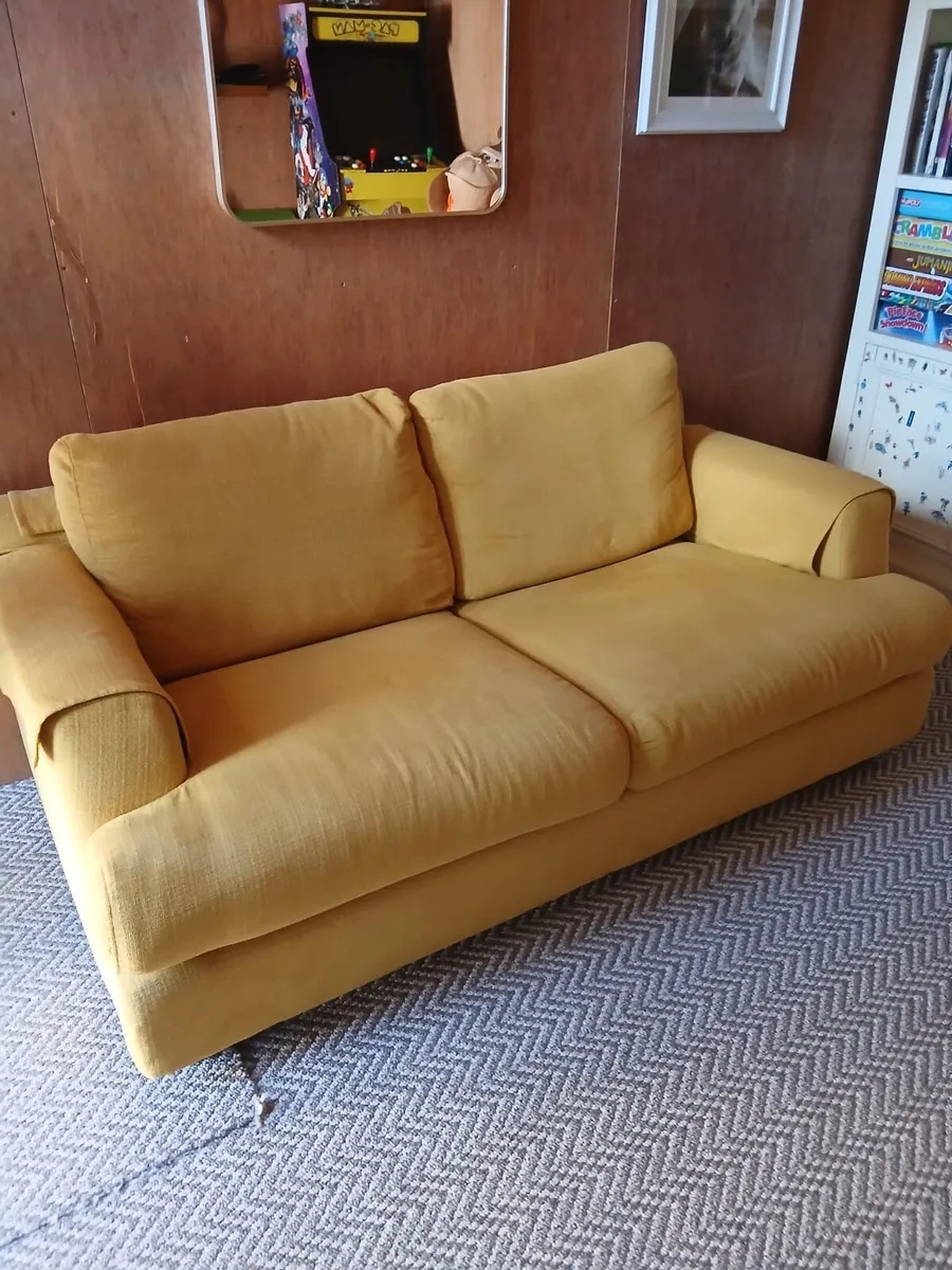 2 seater mustard couch