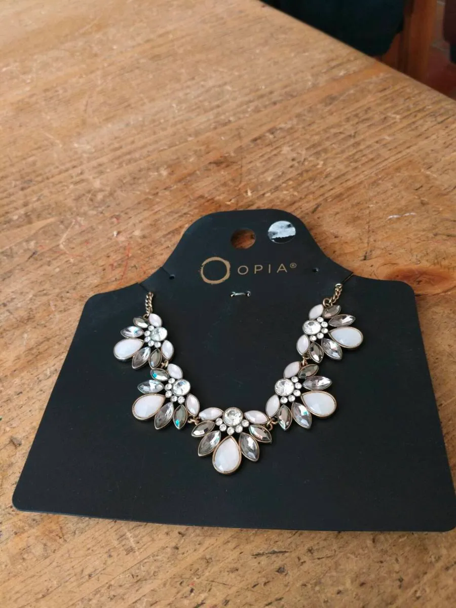 Opia  necklace . New in package - Image 1