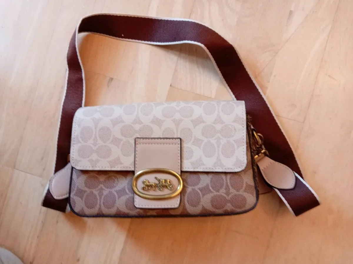 Coach ag - Image 1