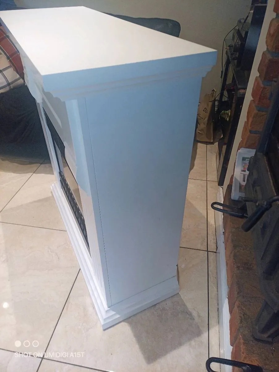 Electric heater with surround - Image 2