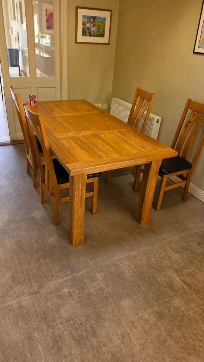 Solid oak table and 6 chairs