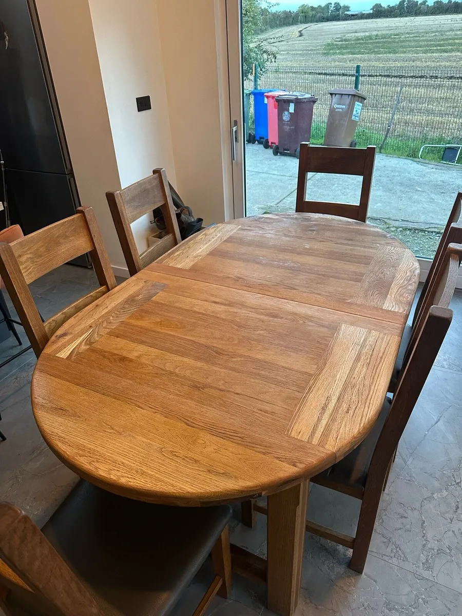 Solid oak table and chairs - Image 1