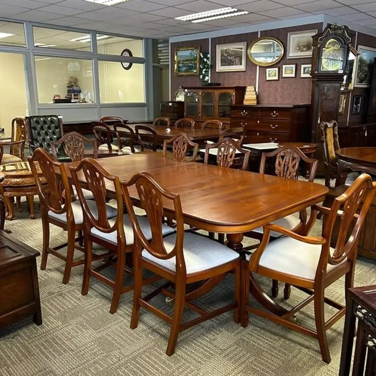 Fabulous large mahogany dining suite, comprising a