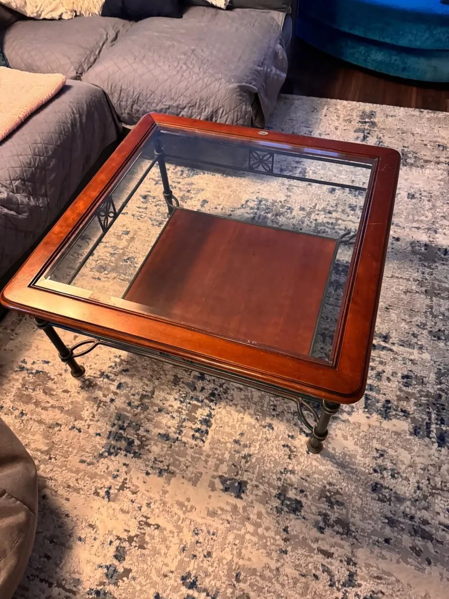 Glass-top coffee table