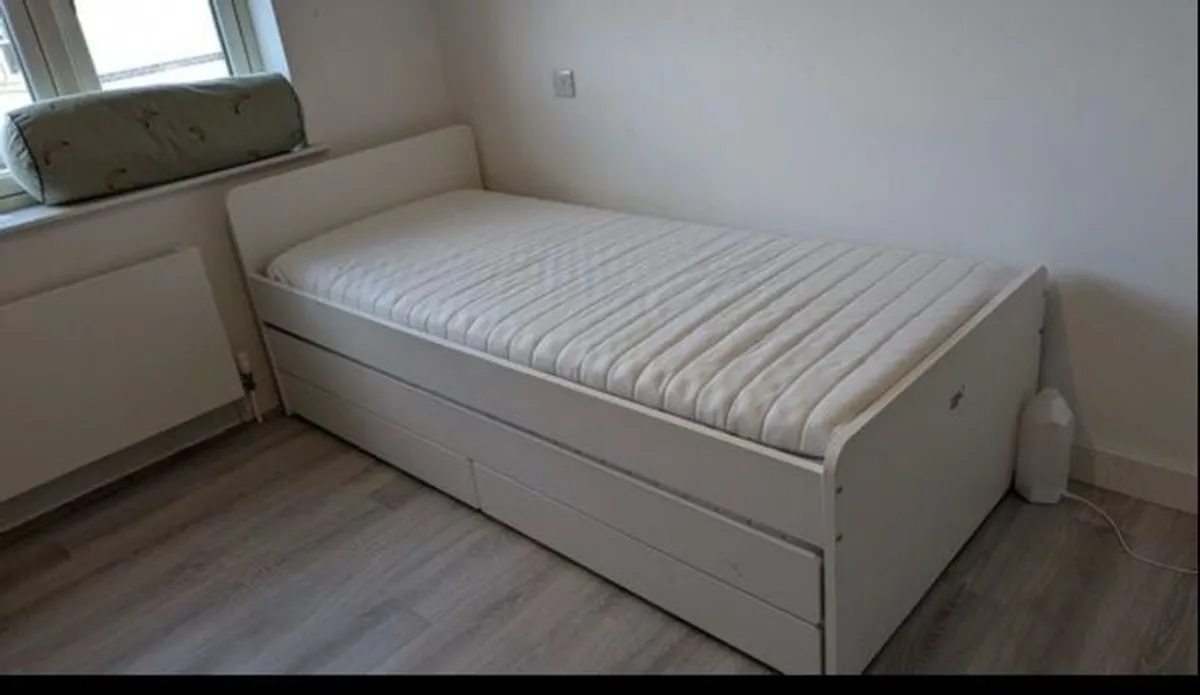 IKEA single bed with storage and extra bed space - Image 1