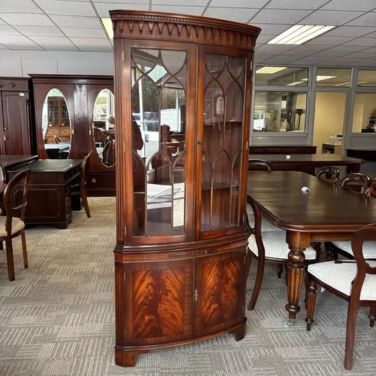 Impressive tall mahogany display corner cabinet wi