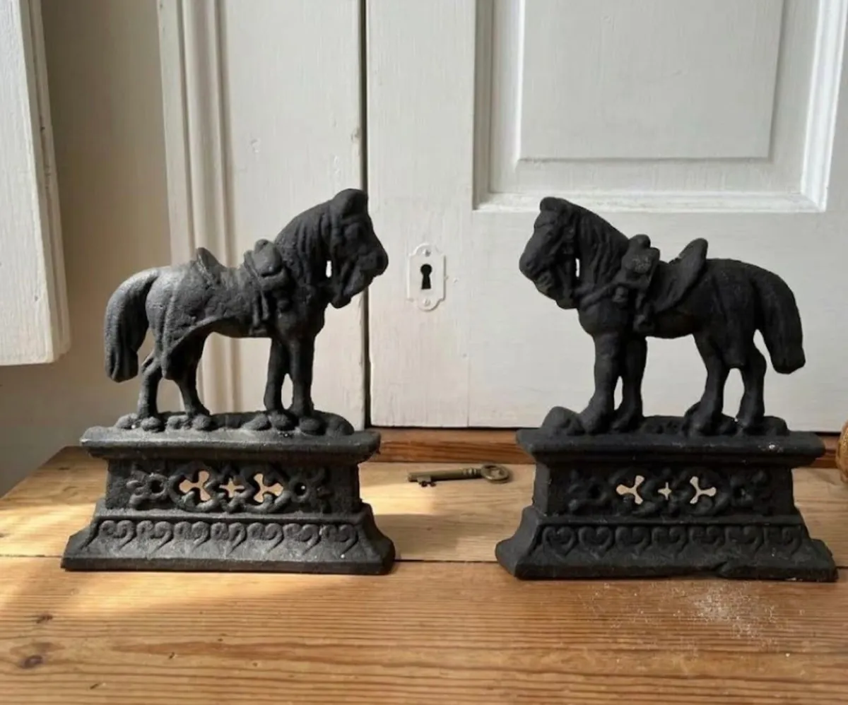 Antique Victorian Cast Iron Door Stops - Image 1