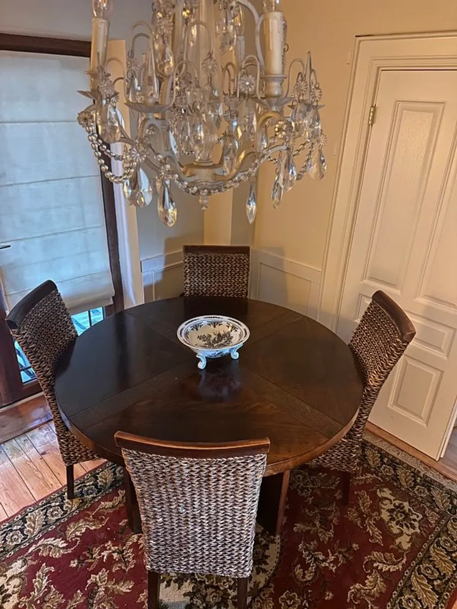 Walnut veneer dining table and four rattan dining chairs - Image 1