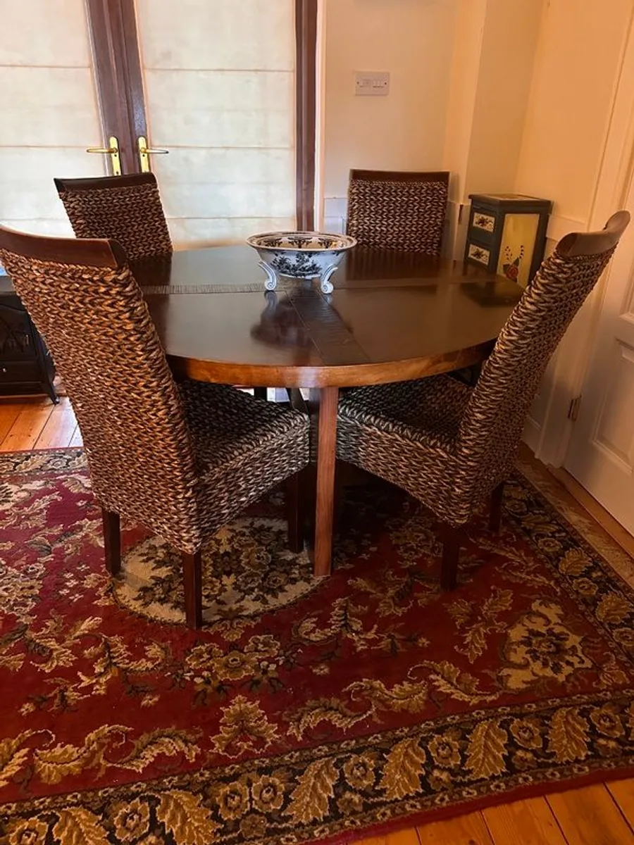 Walnut veneer dining table and four rattan dining chairs - Image 3