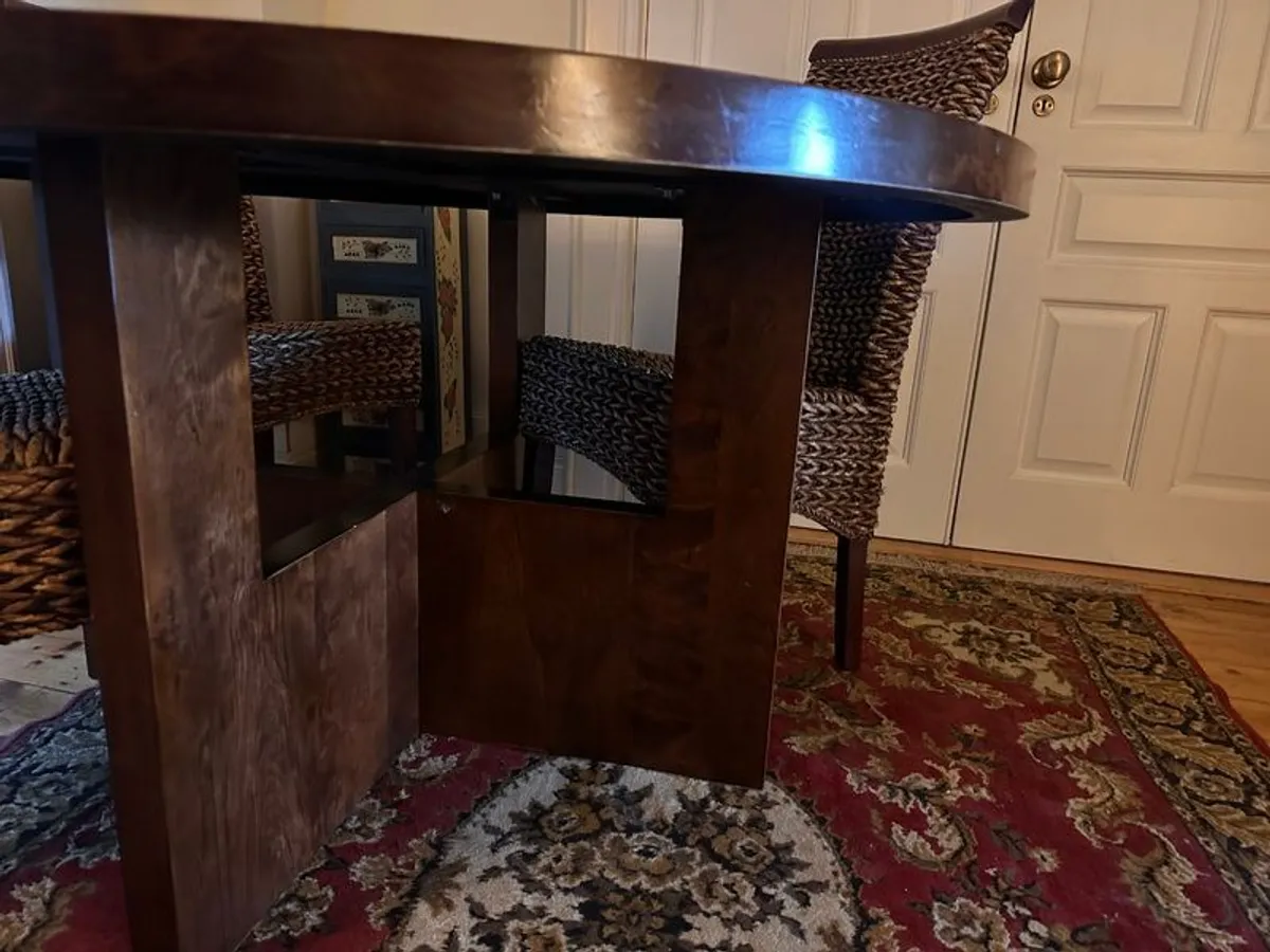 Walnut veneer dining table and four rattan dining chairs for sale in ...