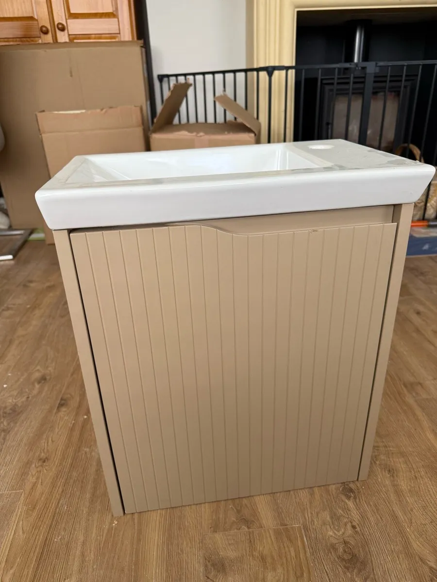 Bathroom sink and cabinet - Image 1