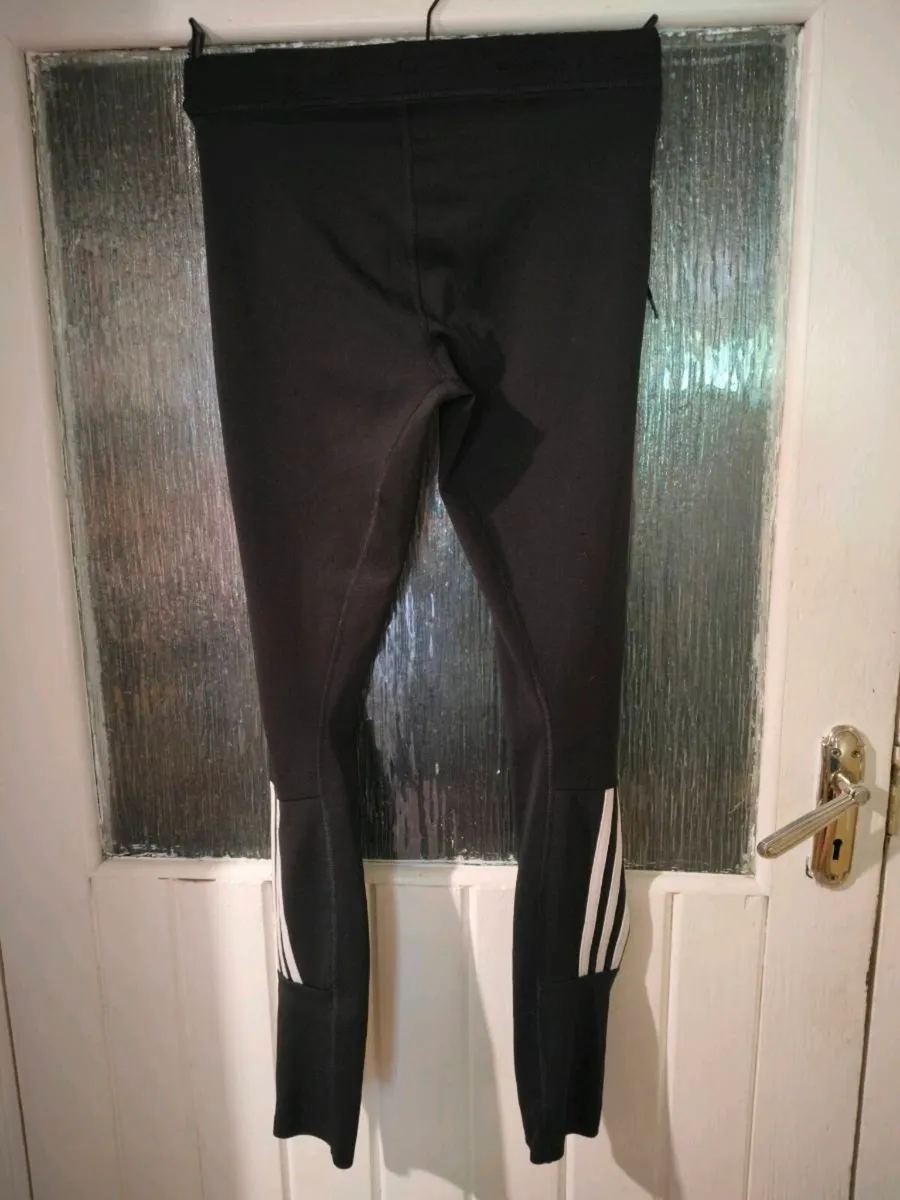 black Adidas Techfit leggings featuring white bran - Image 2