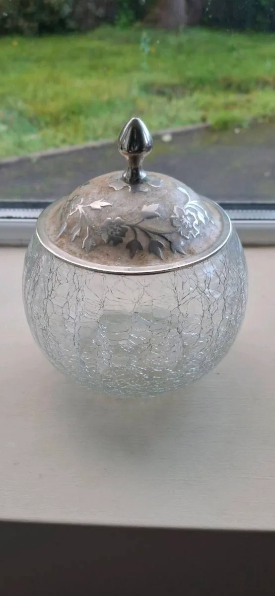 Antique sterling silver lid on decorative jar