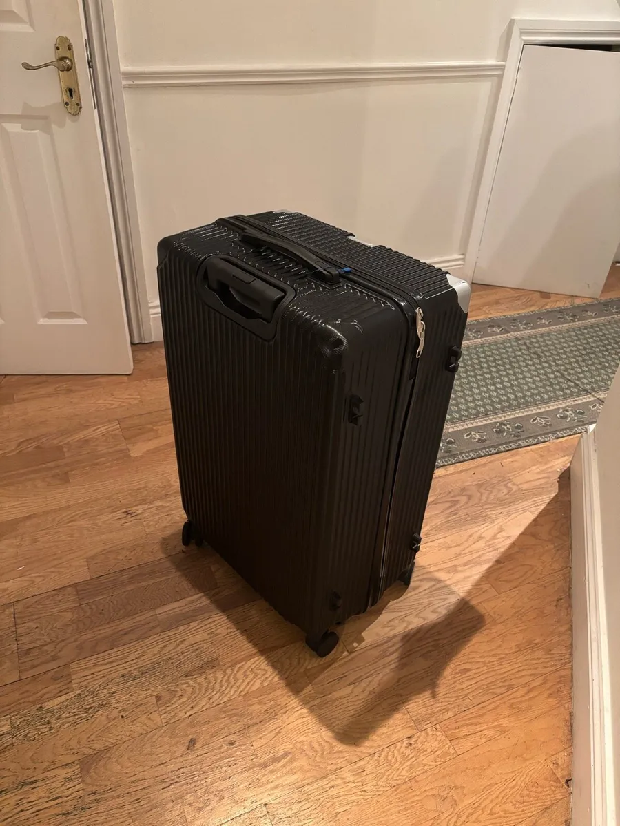 Large black suitcase - Image 1