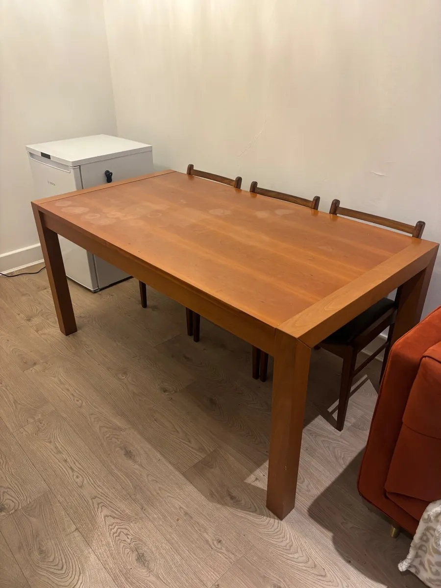 Solid wood dining table - Image 1