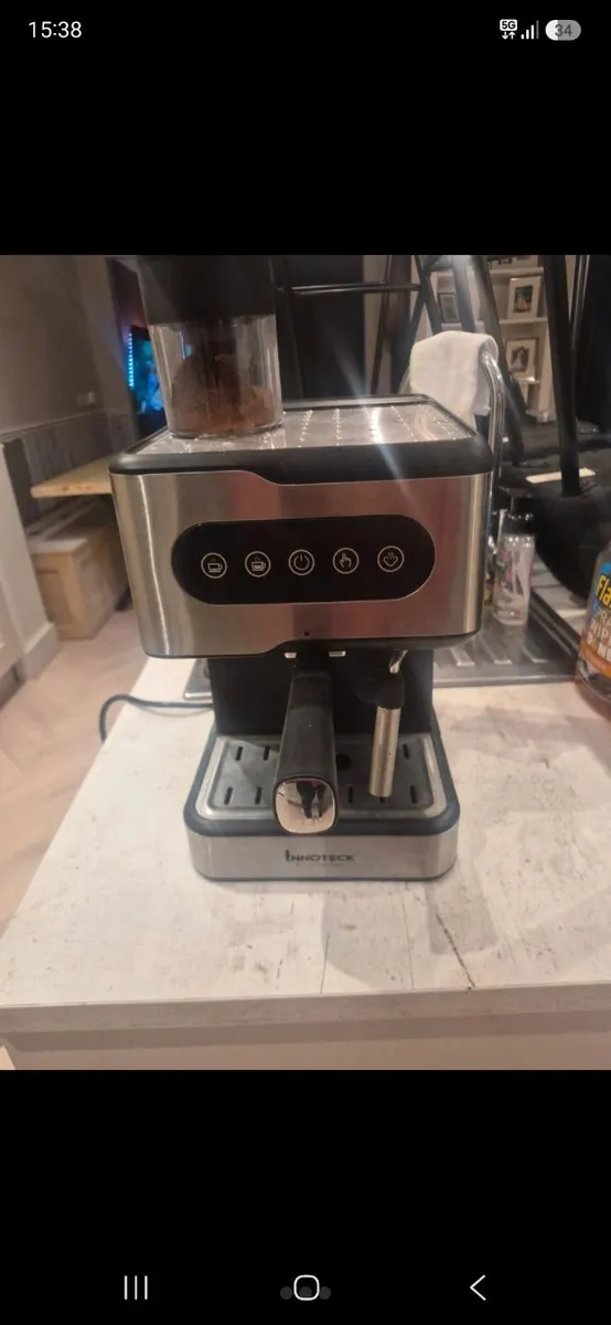 Coffee machine and grinder