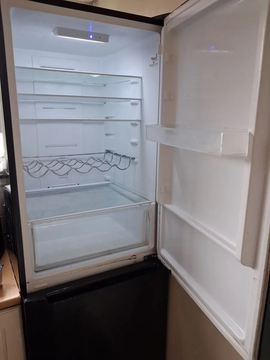Table and fridge - Image 1
