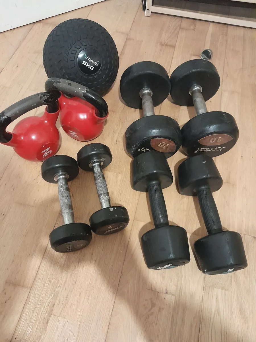 Used dumbbells, kettlebells and slam ball