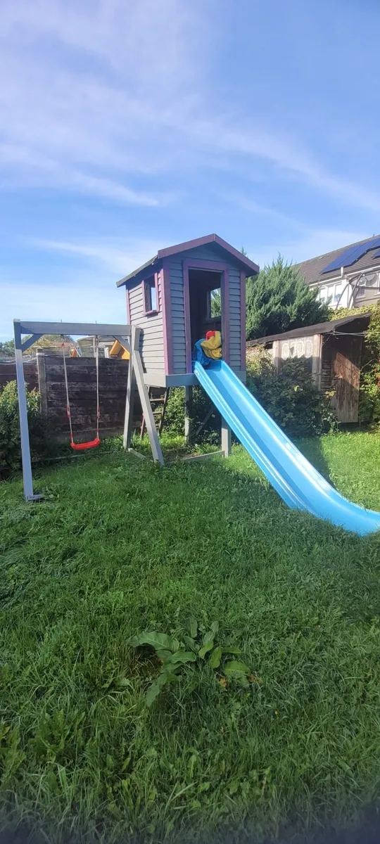 Wooden playhouse with swing and slide - Image 2