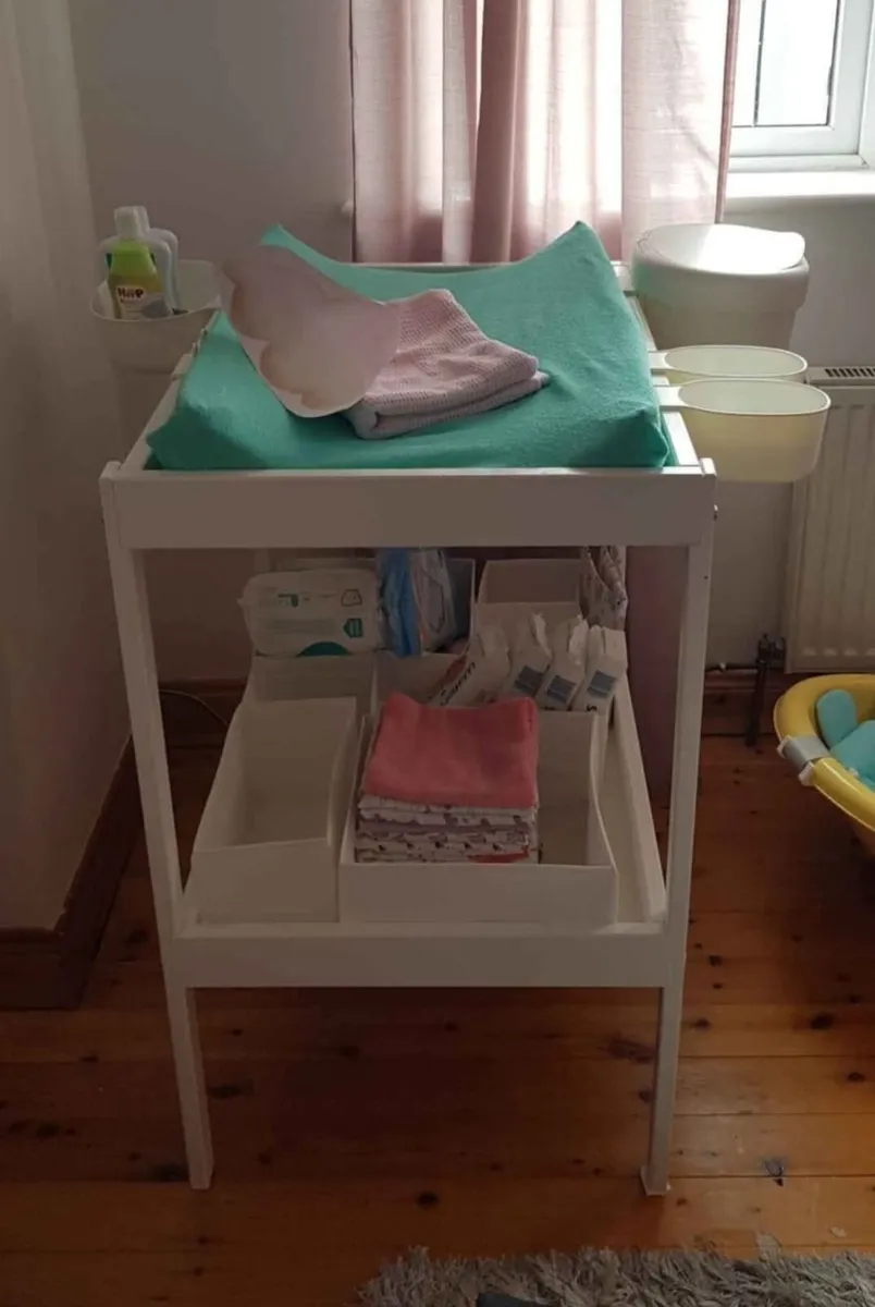 Ikea changing table with mat and accessories
