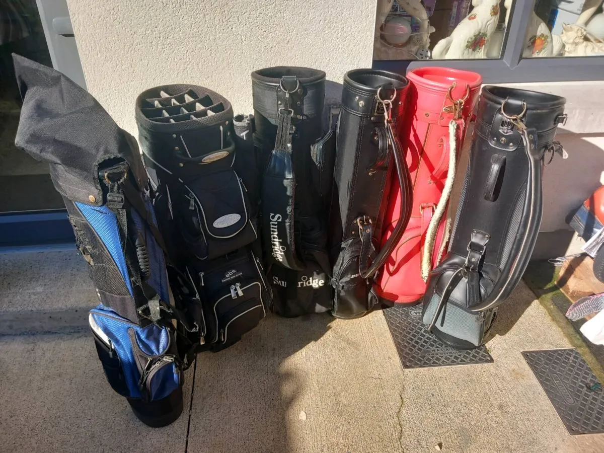 A selection of golf bags. - Image 1