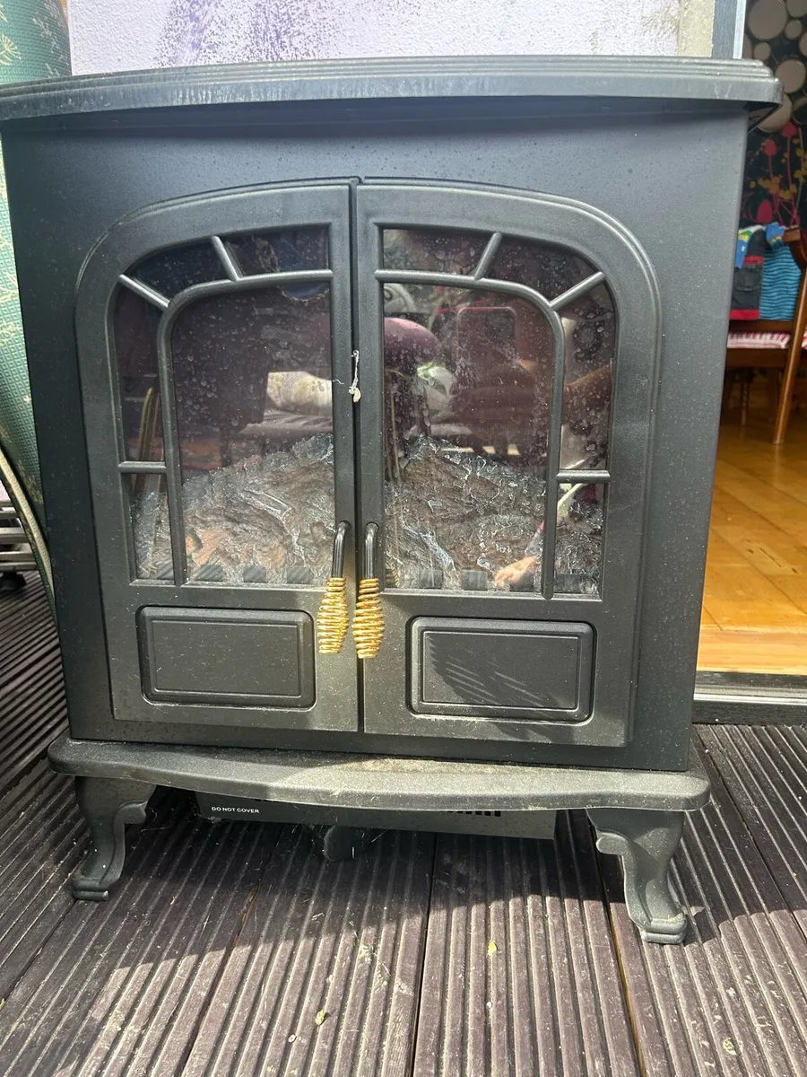 Warmlite plug in electric fire - Image 1