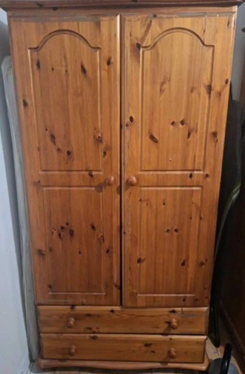 Solid double door wardrobe with drawers