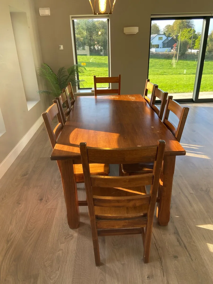 Table and 8 Chairs - Image 1