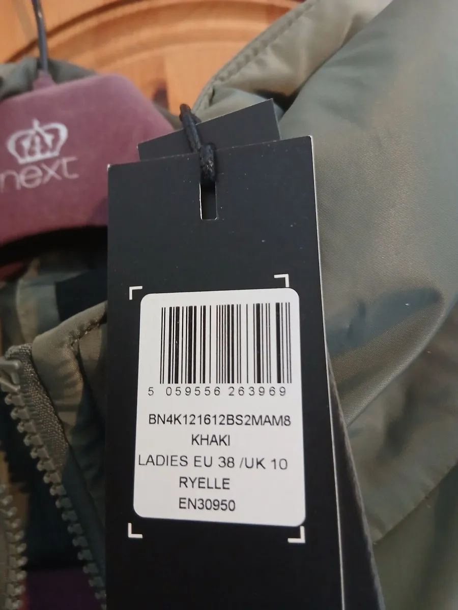 Women's long puffer coat new with tags size 10 - Image 4