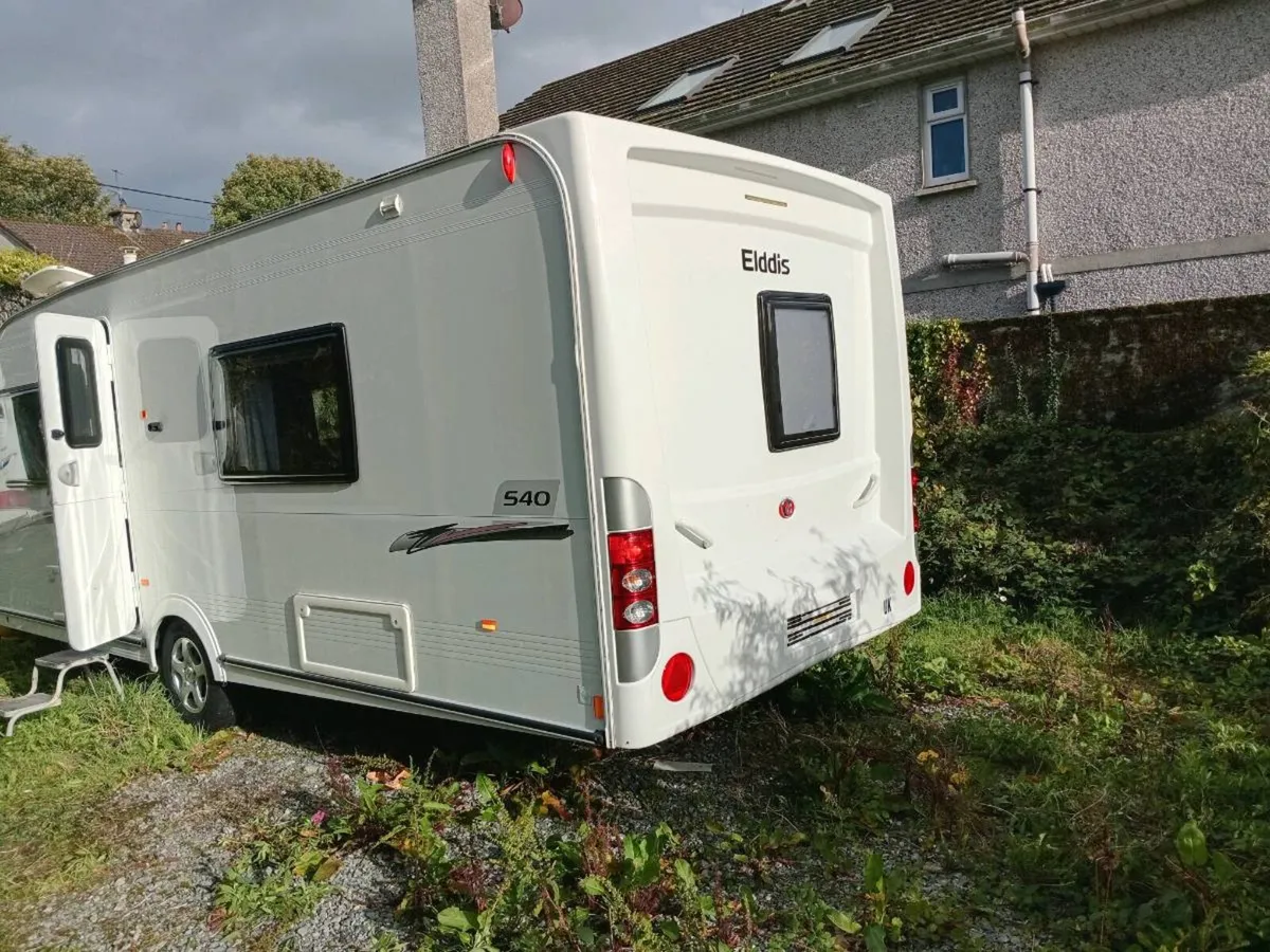 2012 model Elddis caravan 4 Berth end bedroom - Image 2