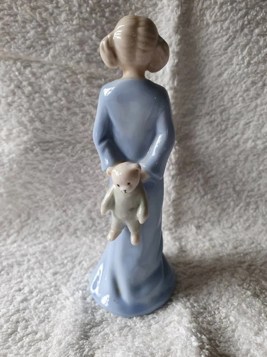 Vintage Porcelain Girl & hidden bear figurine - Image 1
