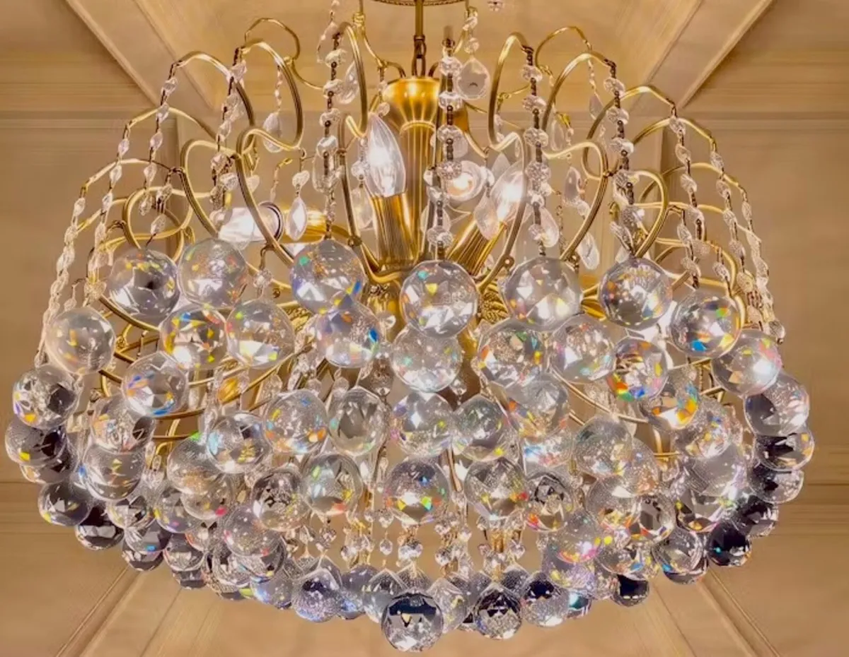 There is about 80 Crystal balls on this chandelier - Image 1