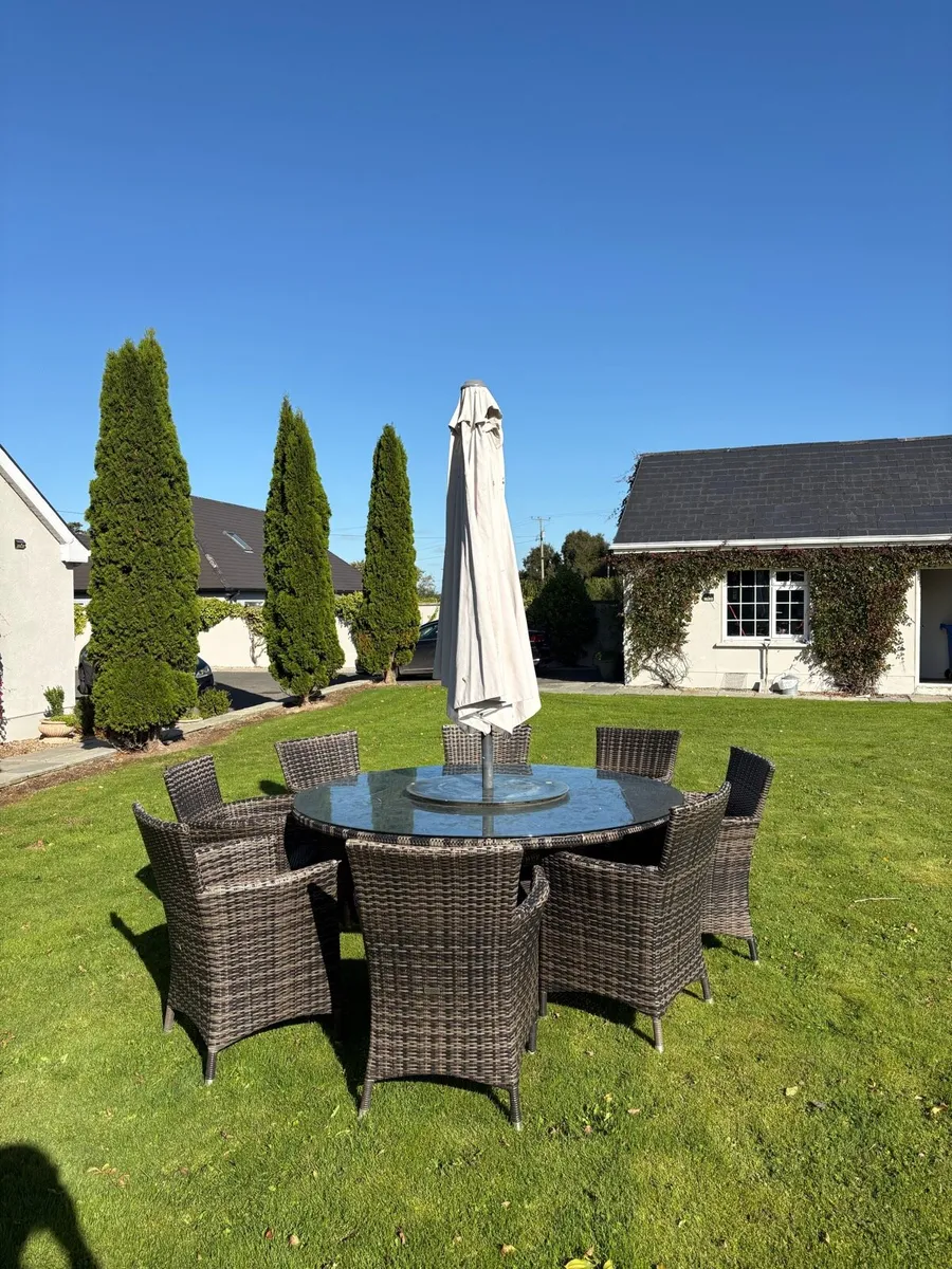 Used outdoor table and chairs - Image 1