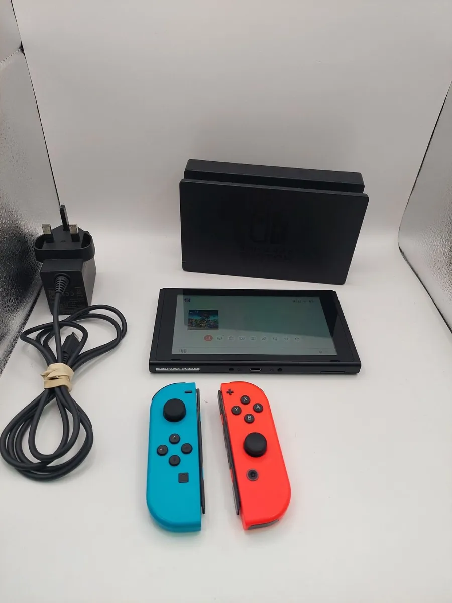 Nintendo Switch + Ring Fit Adventure - Image 1
