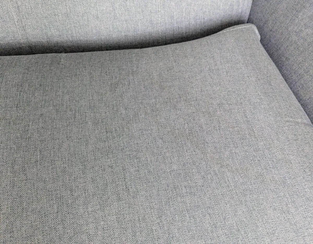 DFS grey fabric sofa - button back detail - Image 4